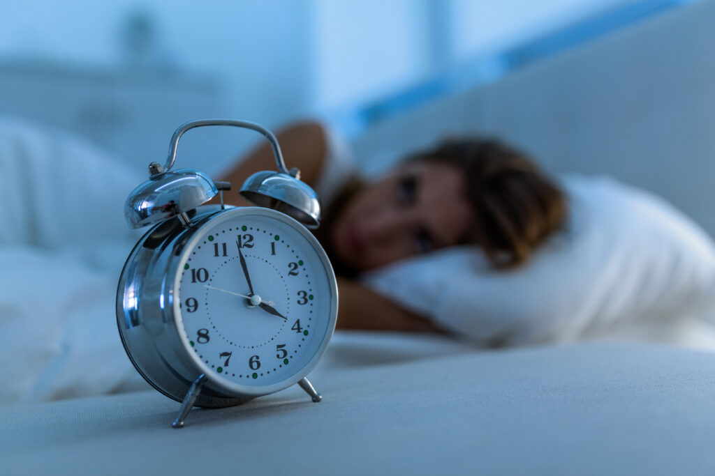 woman-with-insomnia-lying-in-bed-with-open-eyes-girl-in-bed-suffering-insomnia-and-sleep-disorder-thinking-about-his-problem-at-night-scaled